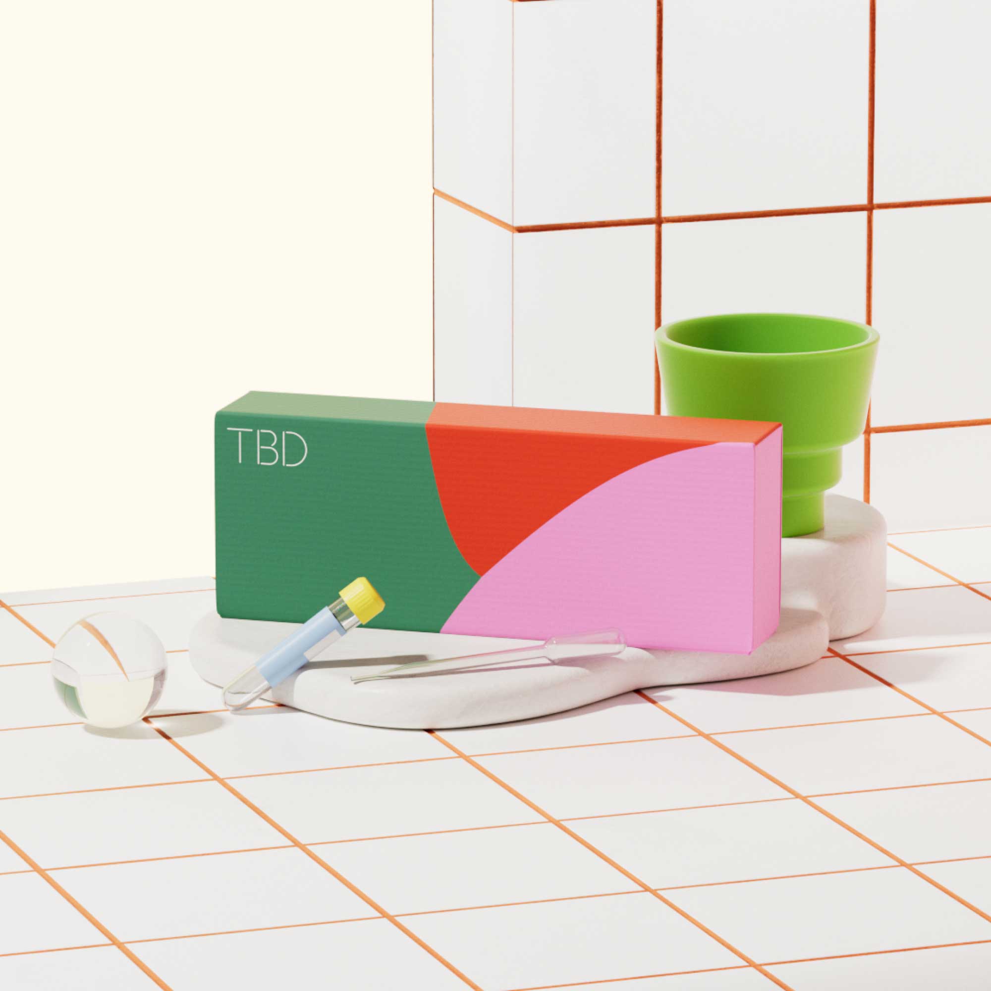 A colorful TBD Health shipping box with test tubes and vials on organic-shaped ceramic blocks on a red and white tiled surface