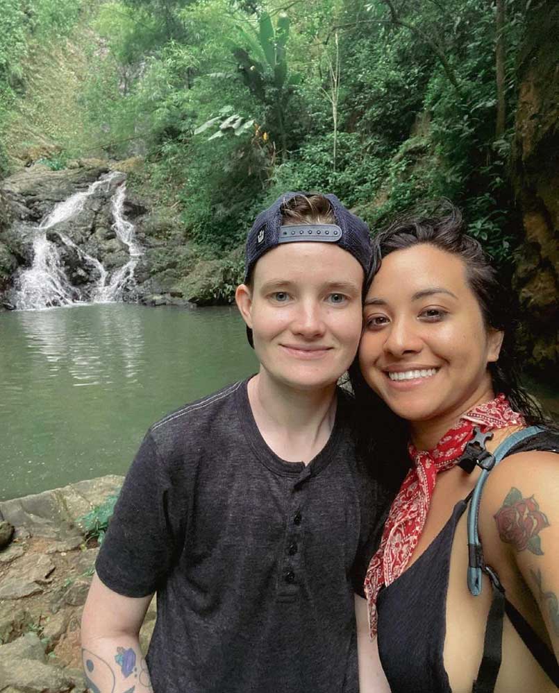 Image of Blix and Bess near a lake in a forest