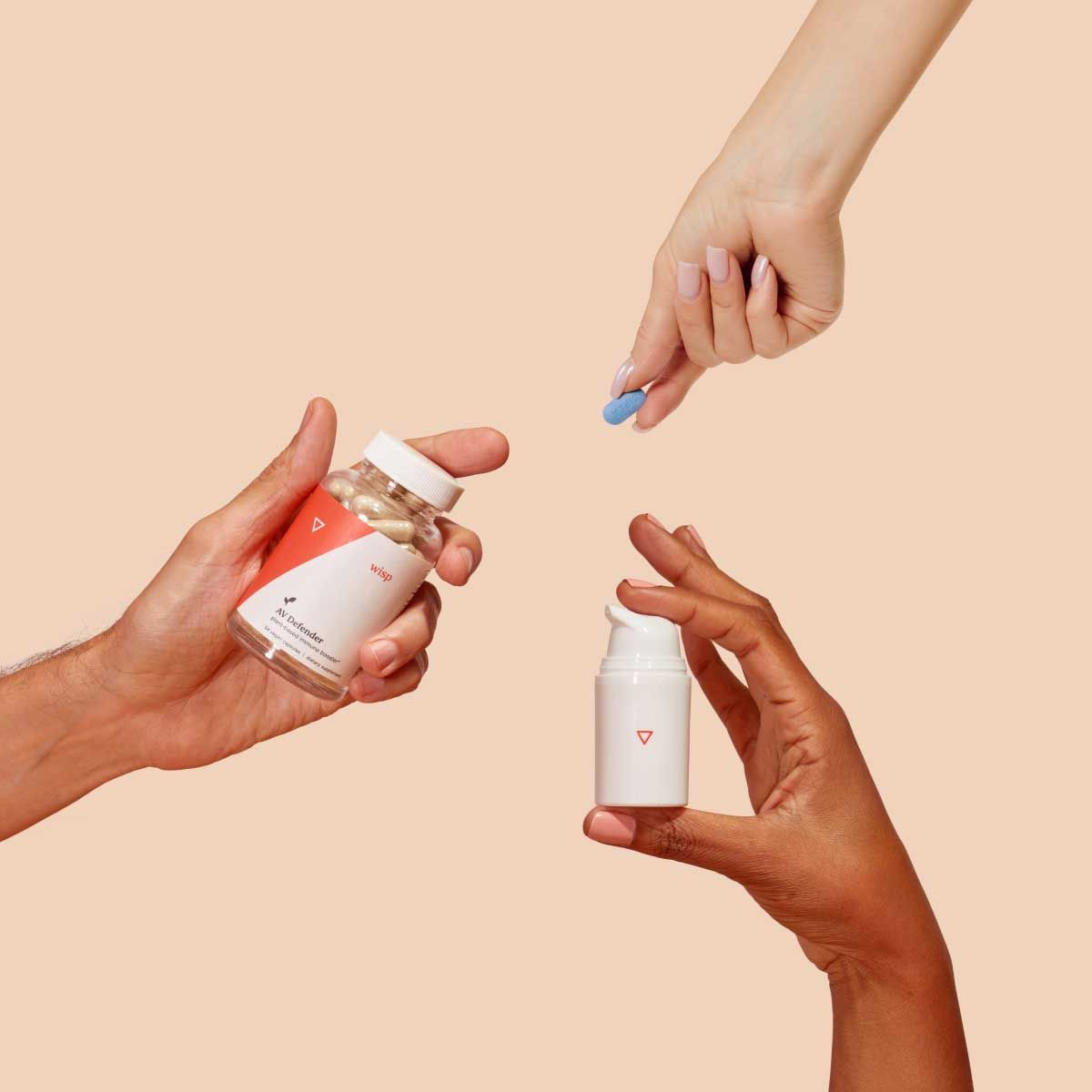 Various Wisp products in people's hands with a cream background