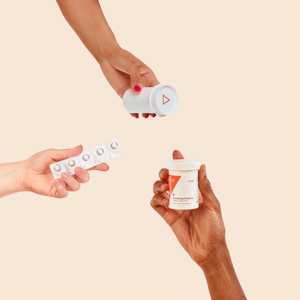 Various Wisp products in people's hands with a cream background
