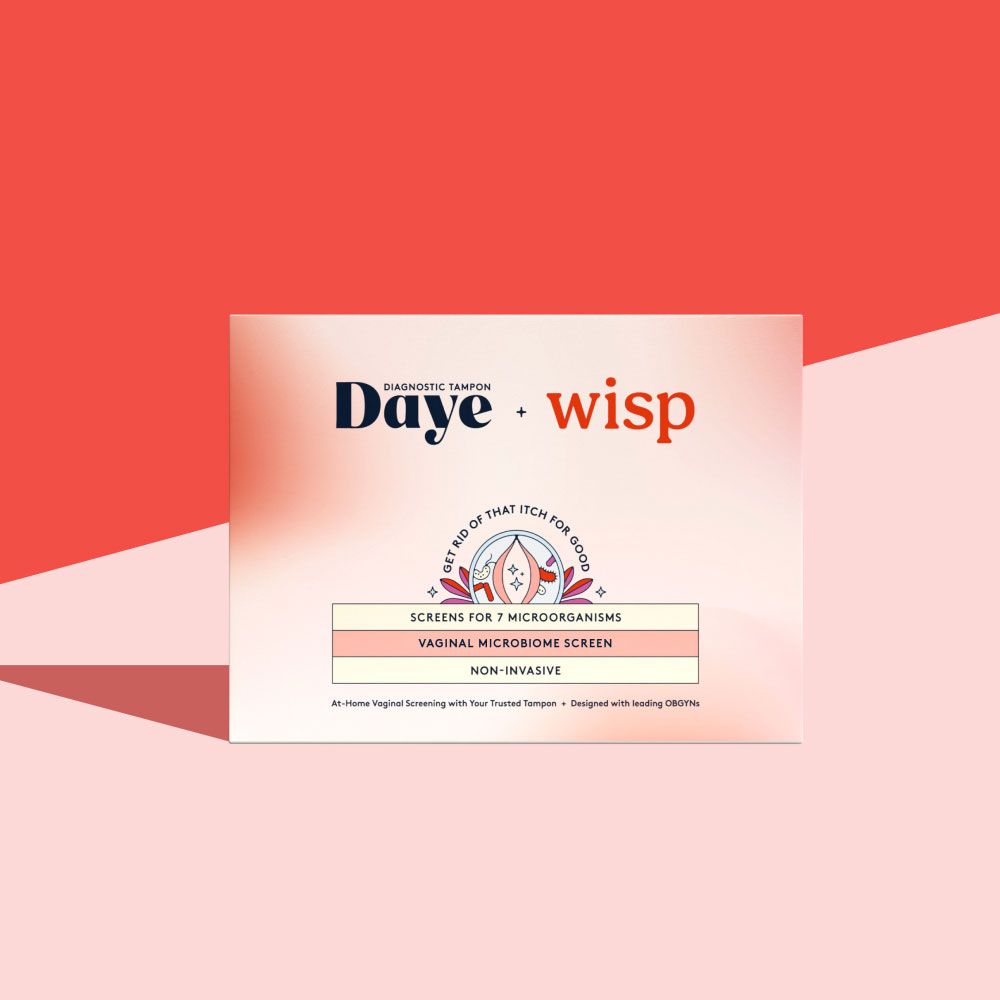 Daye x Wisp vaginal screening kit on a pink surface with a red background
