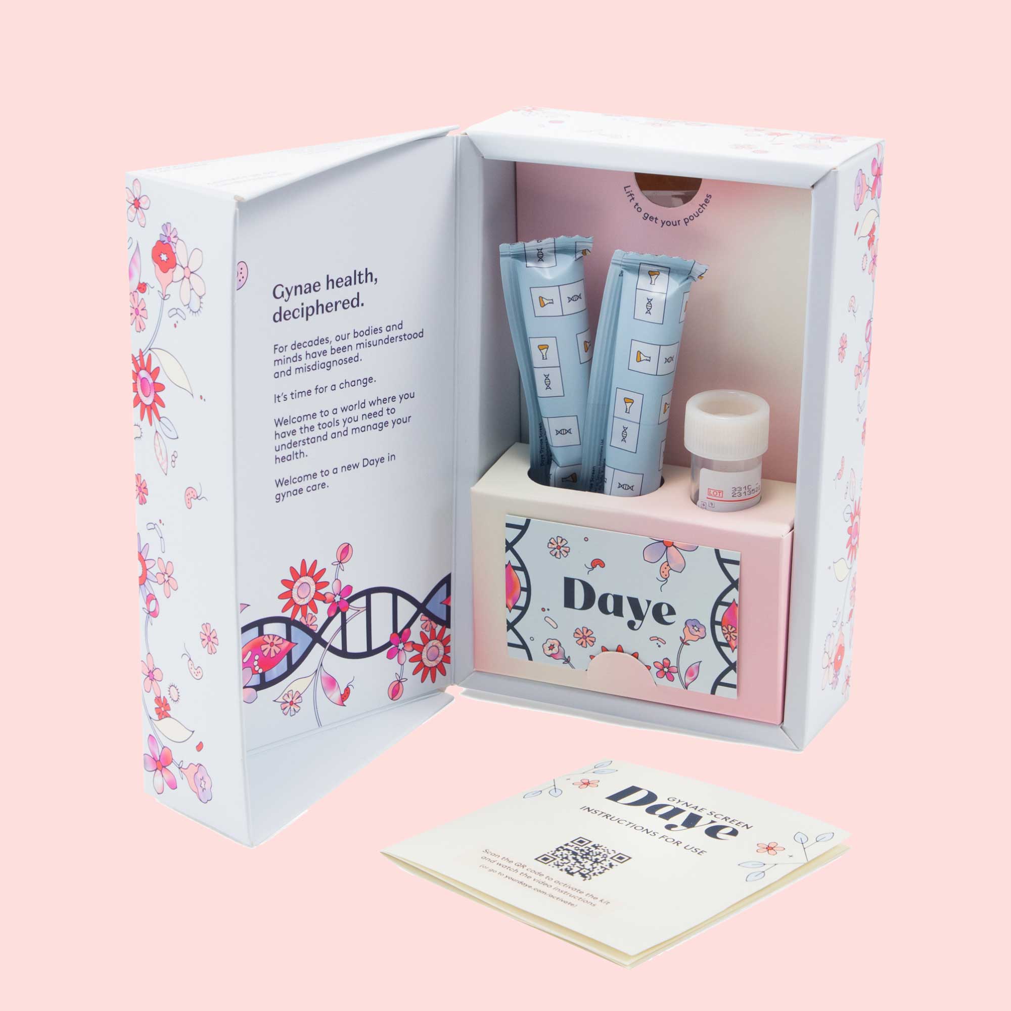 Daye At-Home Vaginal Microbiome Test box, tampons, test tube and pamphlet on a pink surface