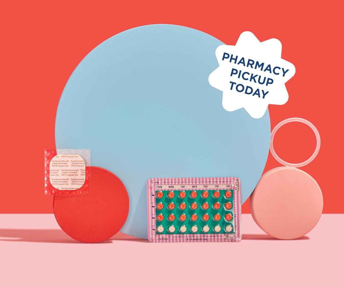 The birth control patch, ring, and pill are balanced on colorful abstract shapes on a pink surface with a red background