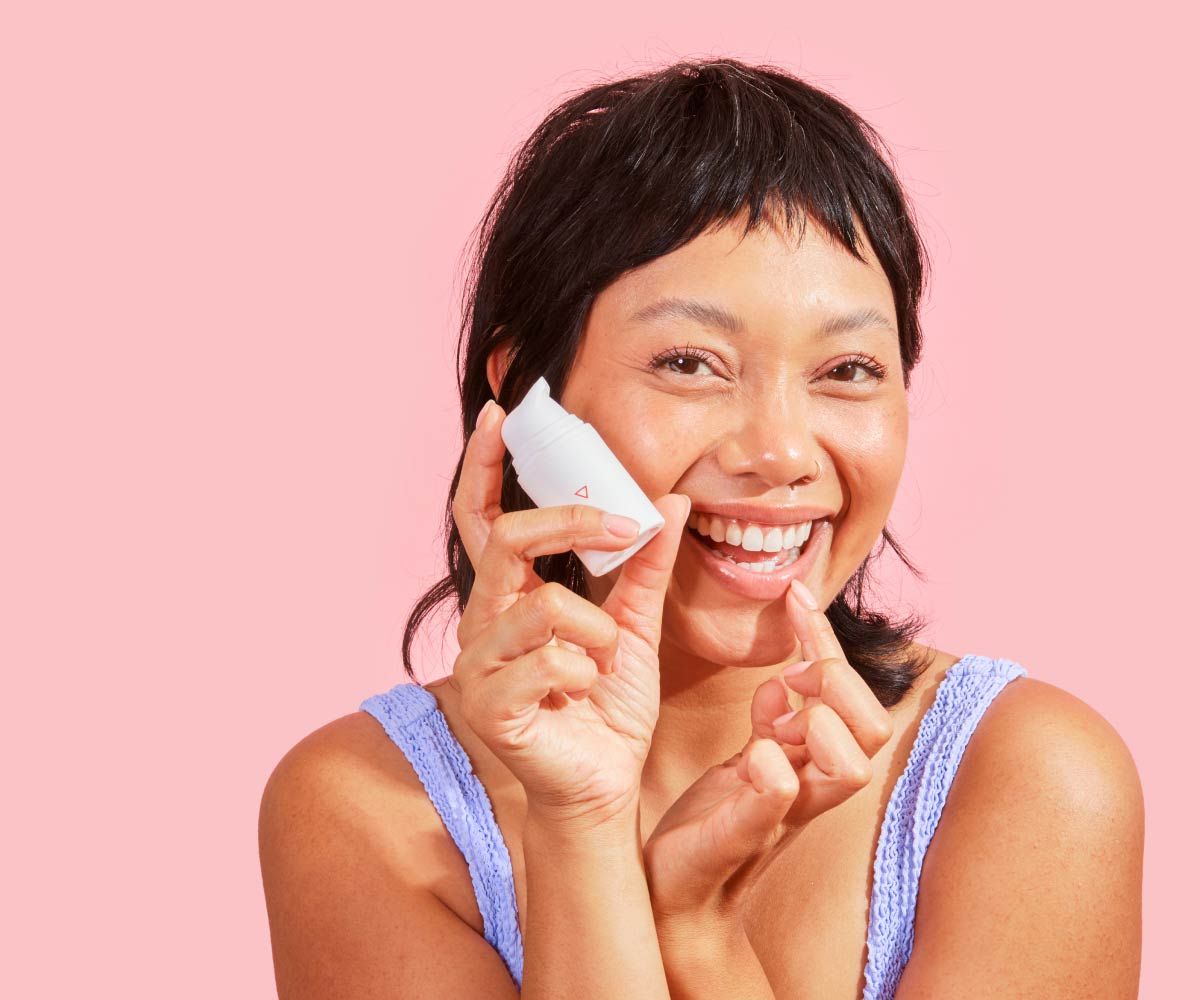 A beautiful woman treats a cold sore with Wisp prescription herpes medication
