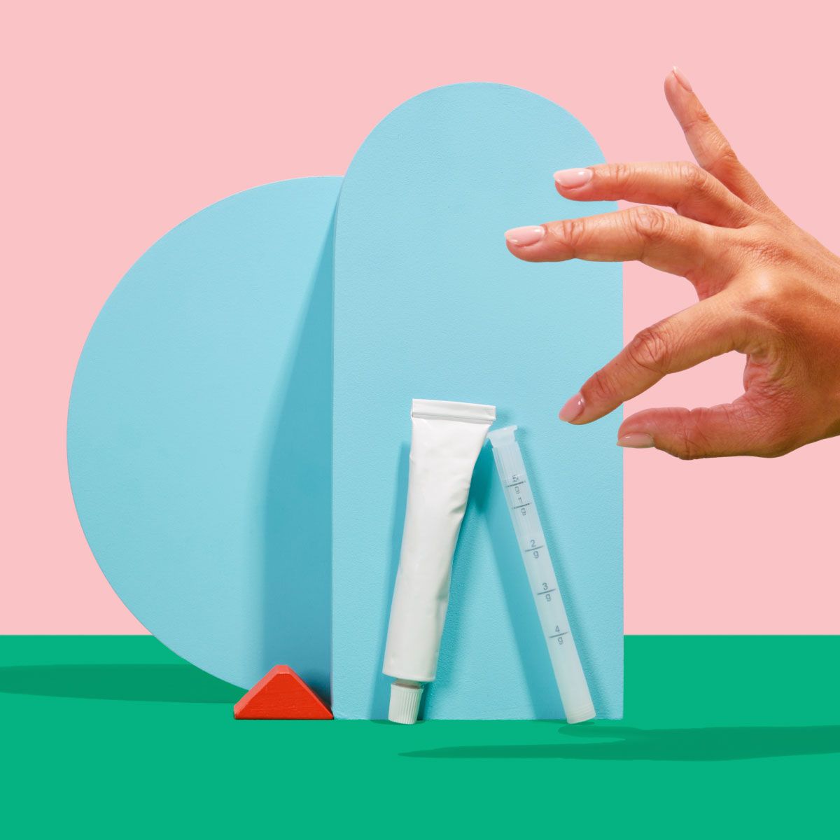 a woman's hand reaches for Wisp vaginal dryness treatment on a colorful geometric background