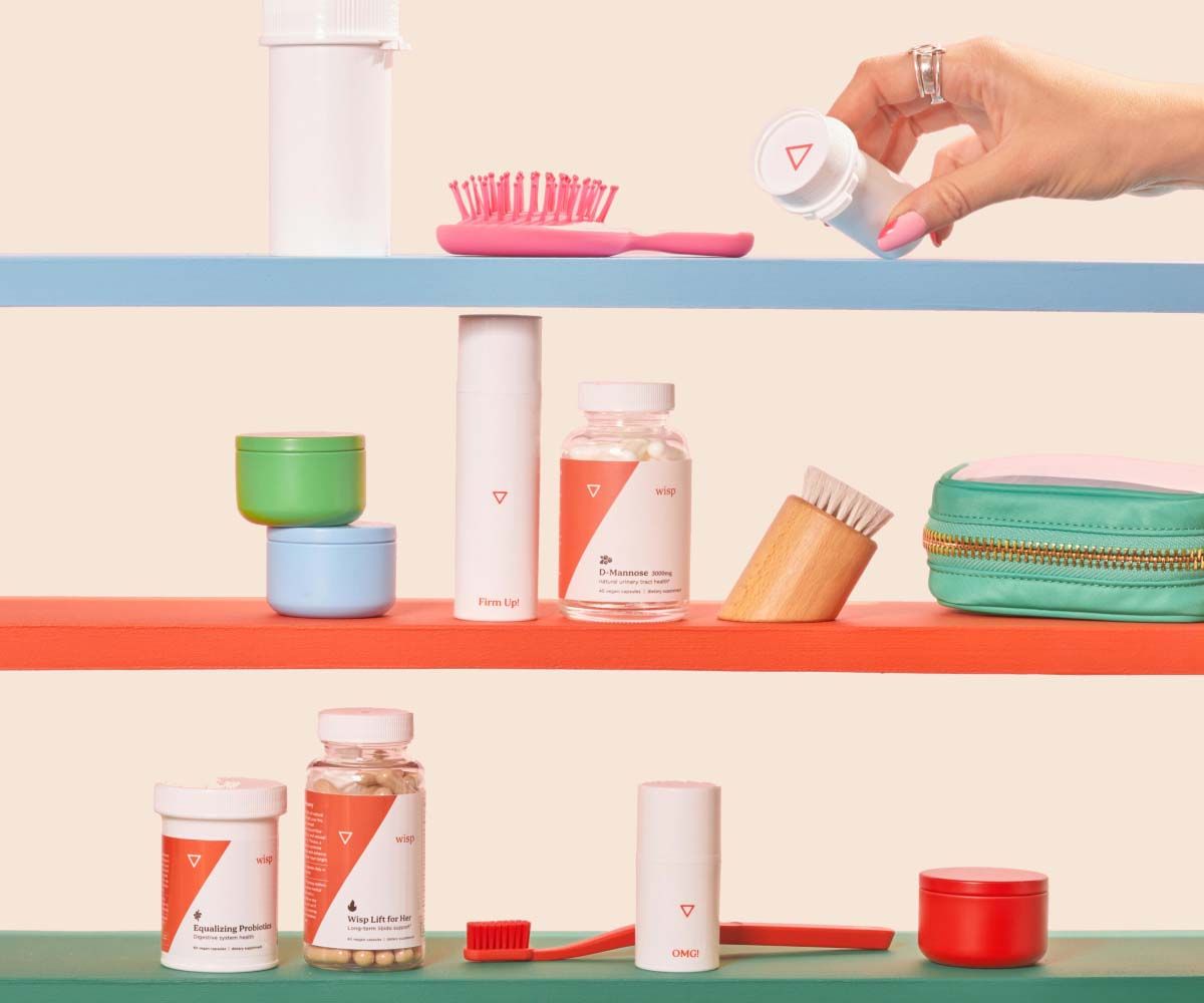 Various Wisp products on colorful shelves with a cream background