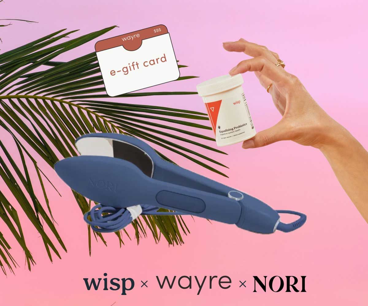 A woman's hand holding Wisp Equalizing Probiotics with a Wayre gift card and Nori Steam Press on a palm tree and sunset background