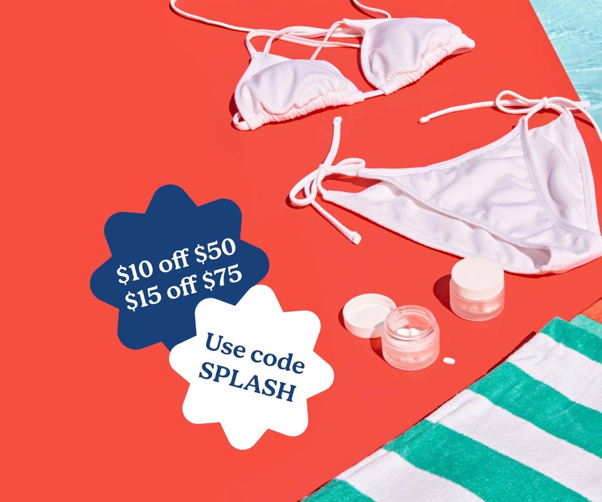 A white bikini, striped towels, and Wisp medications sitting on a red surface next to a pool