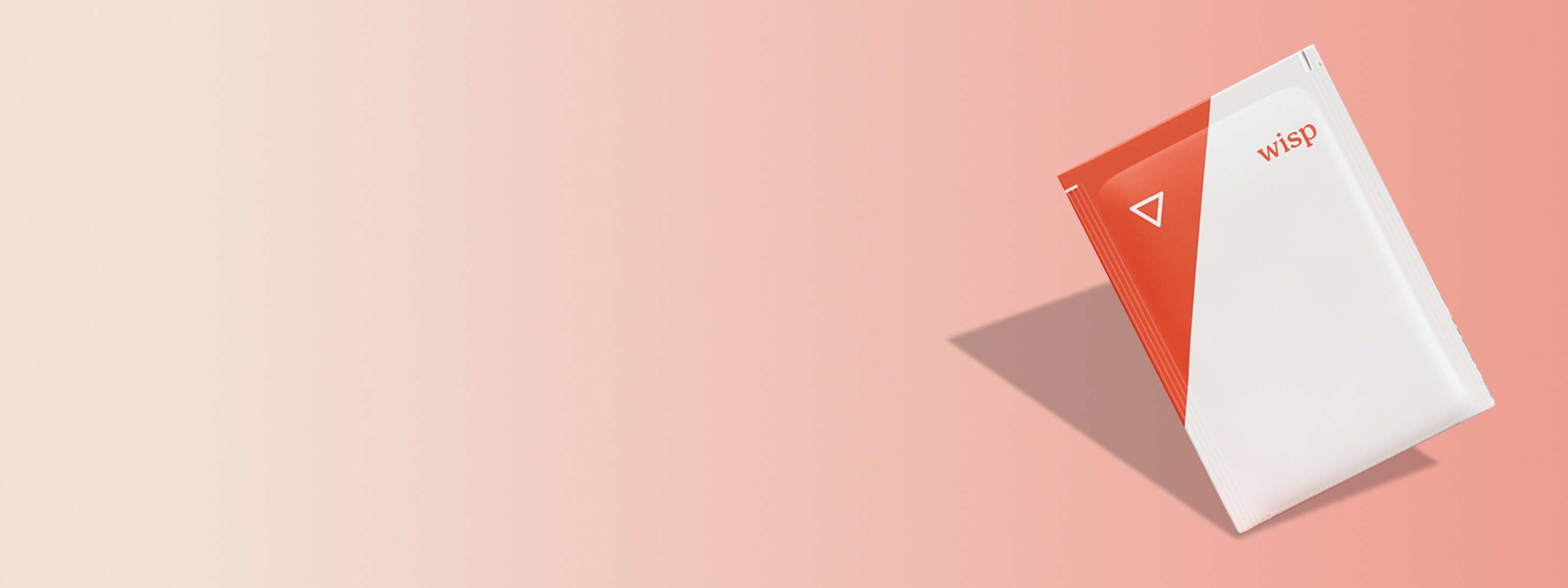 fosfomycin medication powder pack in front of an orange background