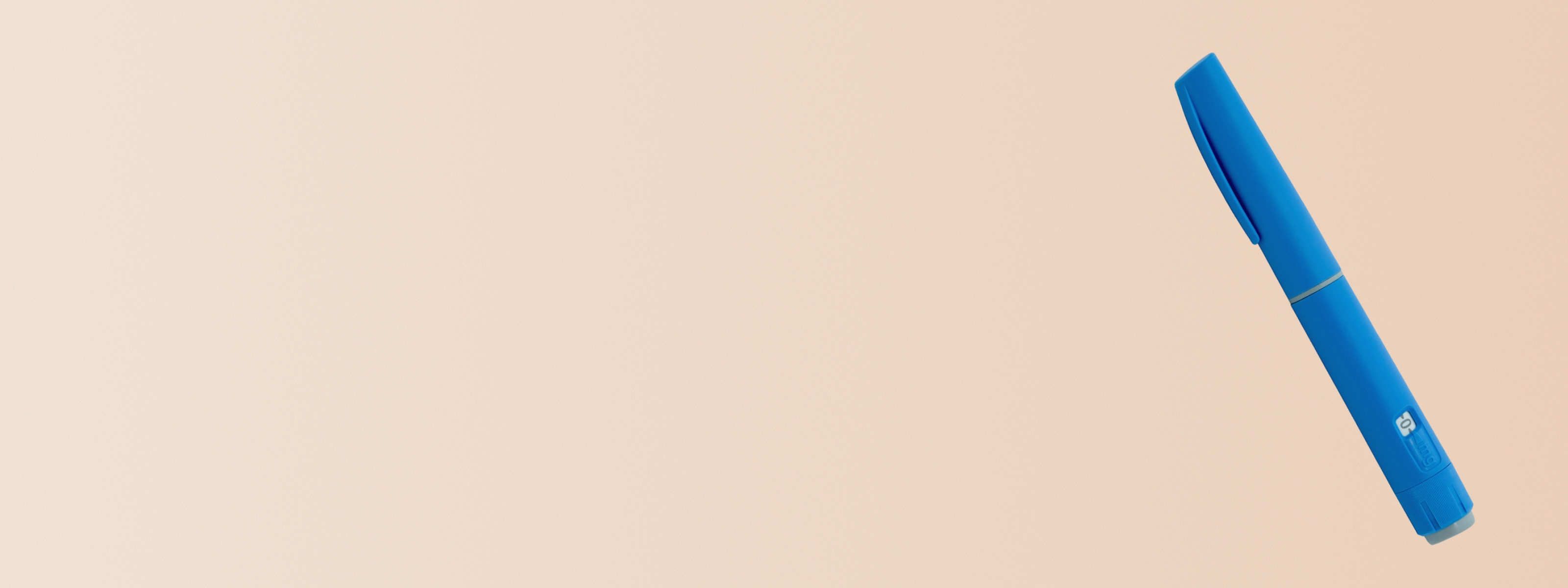 An Ozempic injectable on a beige background