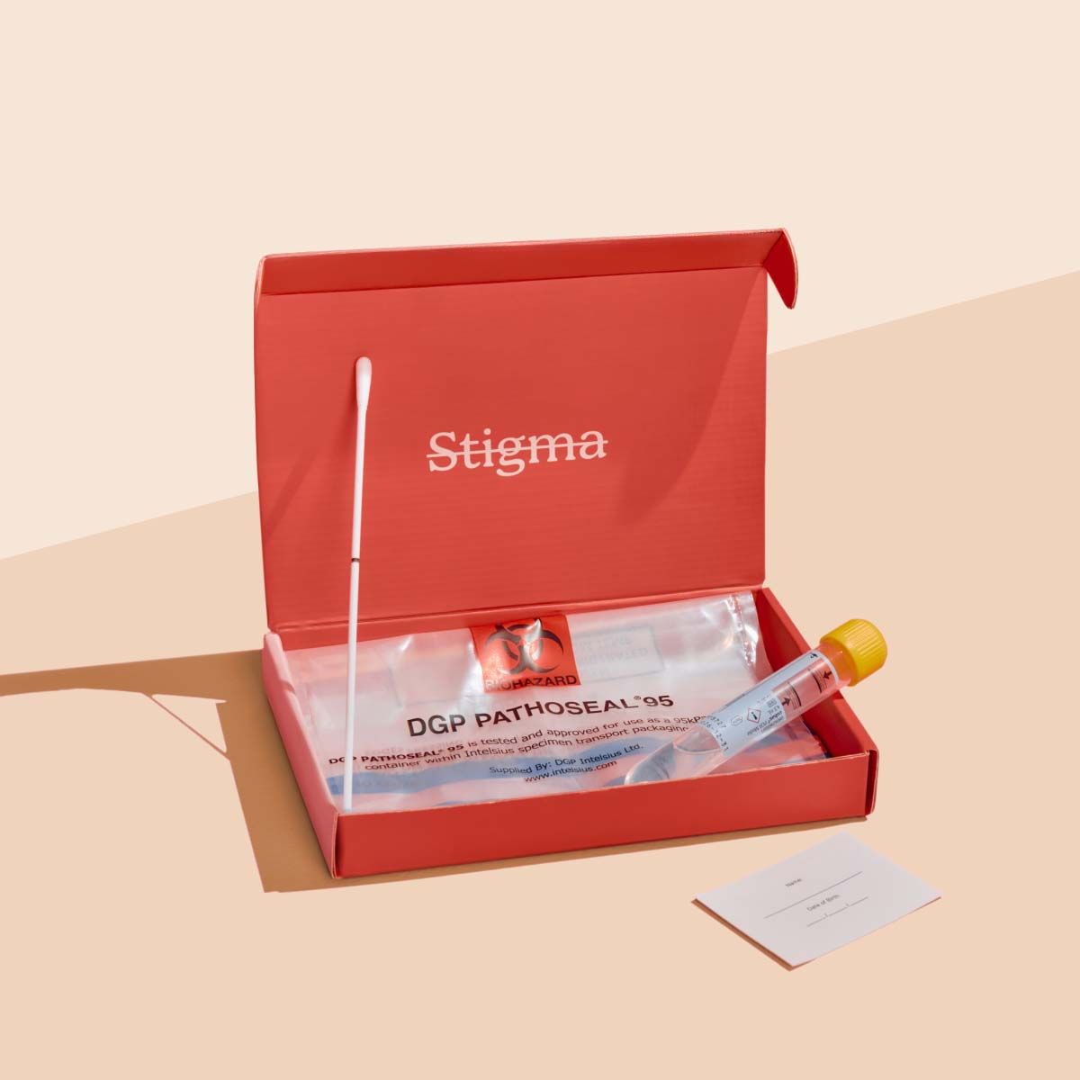 A Wisp diagnostics box with sample collection supplies on a cream surface