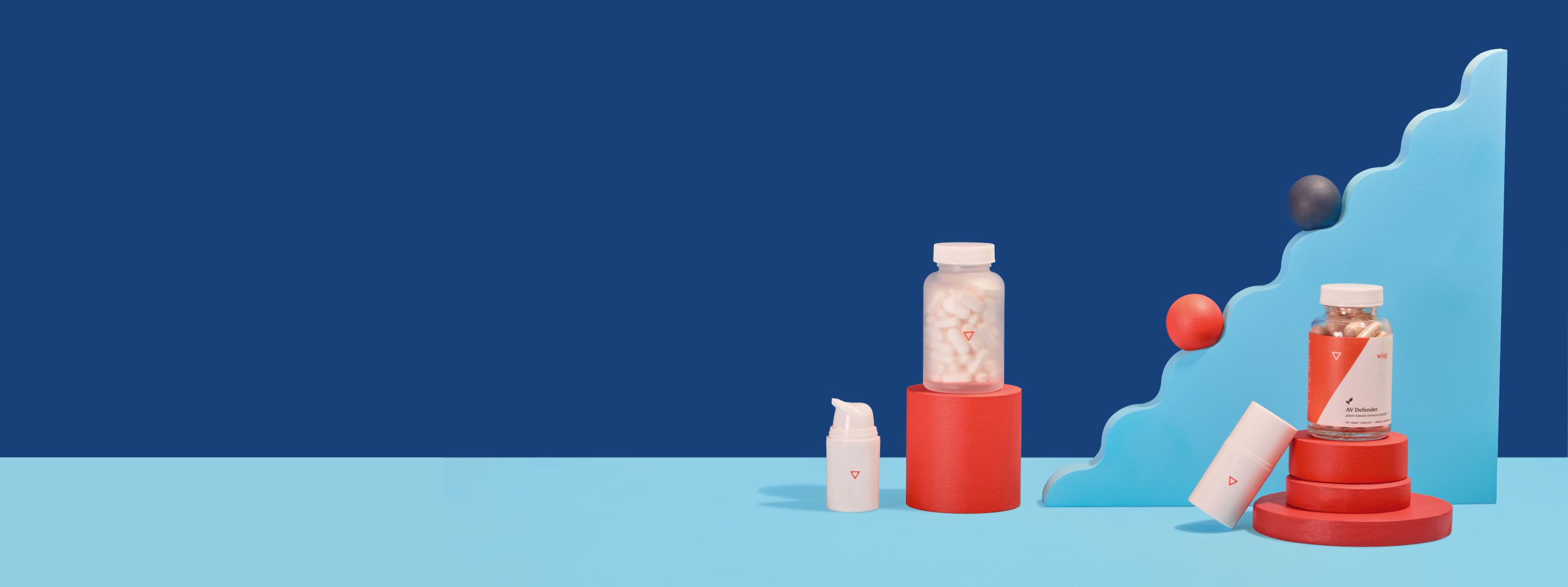 Wisp Herpes medications surrounded by colorful abstract shapes on a two-toned blue background