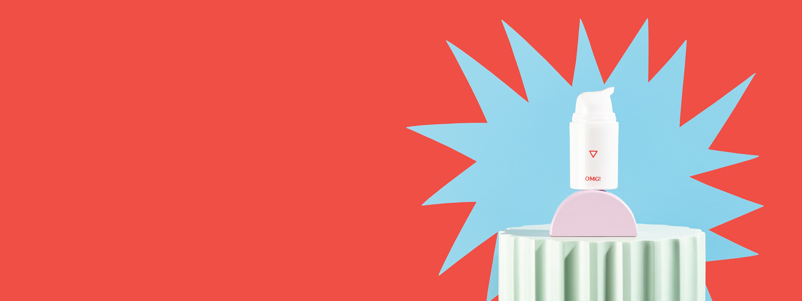 A bottle of OMG! Cream sits on colorful abstract shapes with a blue starburst pattern and a red background
