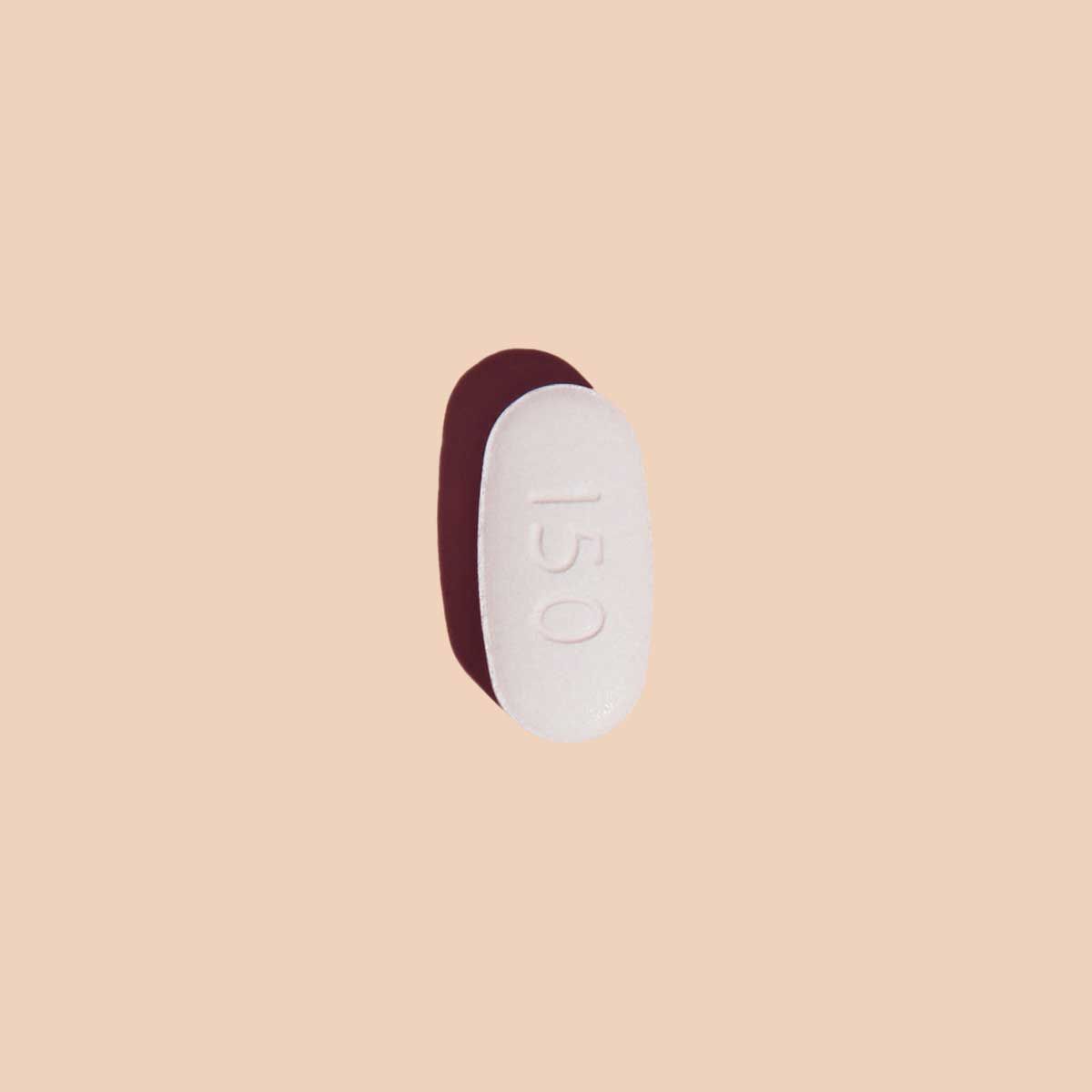 Antifungal pill to treat yeast infections on a cream surface