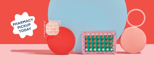The birth control patch, ring, and pill are balanced on colorful abstract shapes on a pink surface with a red background