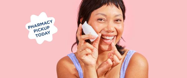 A beautiful woman treats a cold sore with Wisp prescription herpes medication