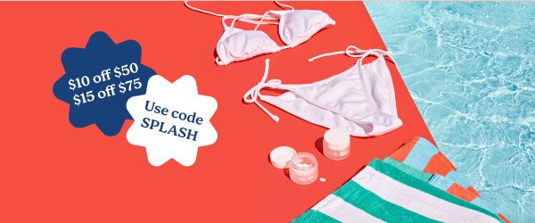 A white bikini, striped towels, and Wisp medications sitting on a red surface next to a pool