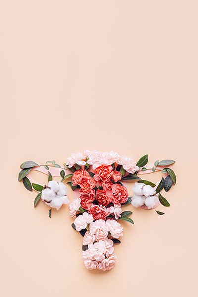 Florals arranged in the shape of ovaries and a uterus