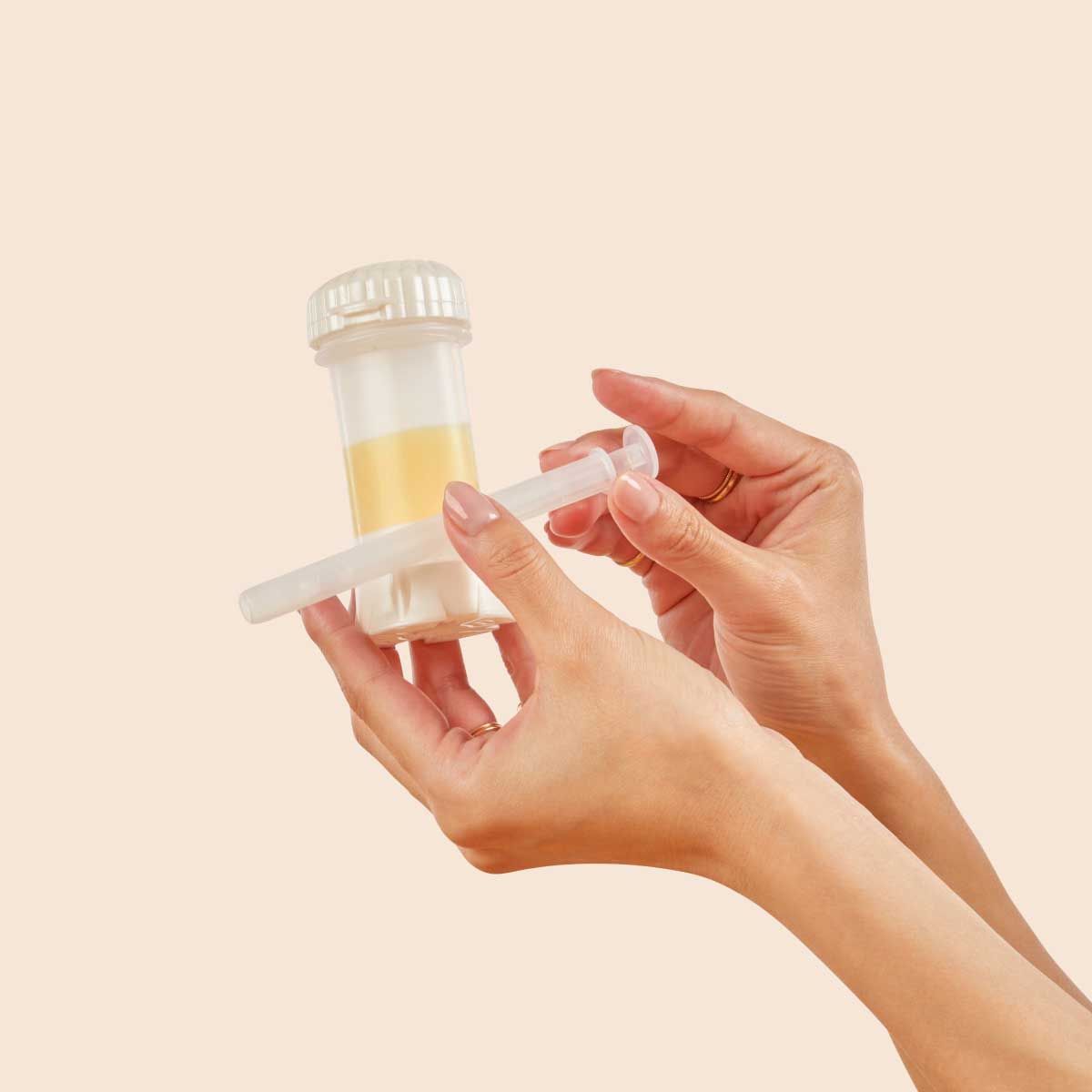 Wisp Non-Hormonal Vaginal Moisturizer tube and applicator with a cream background