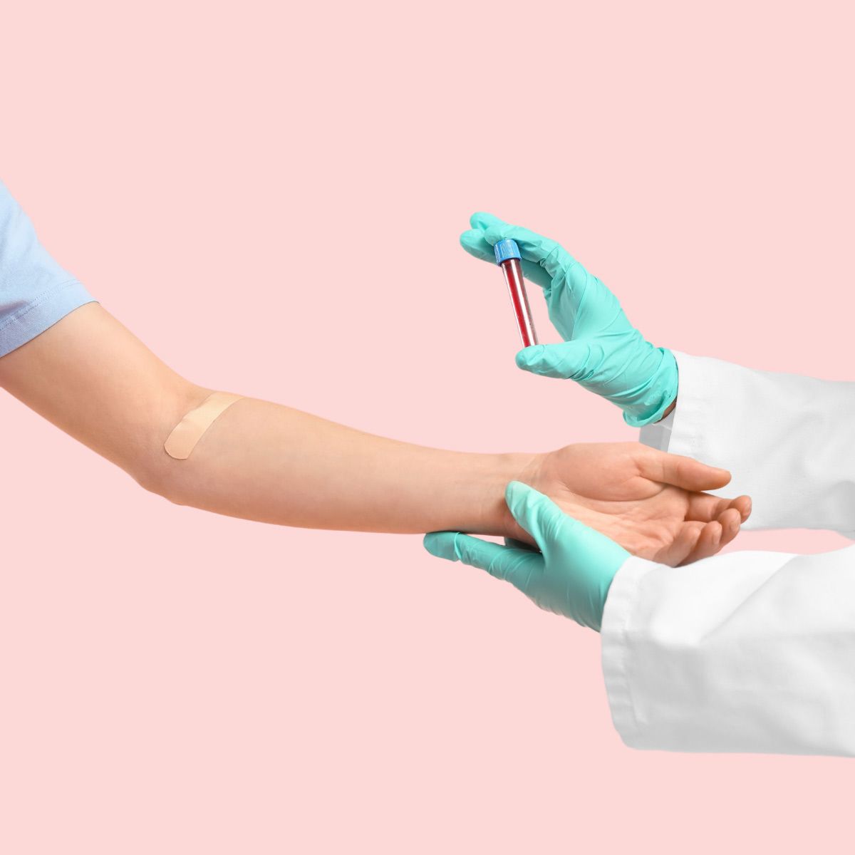 a woman's arm with a bandage after a blood draw, held by a doctor with gloved hands holding a vial of blood