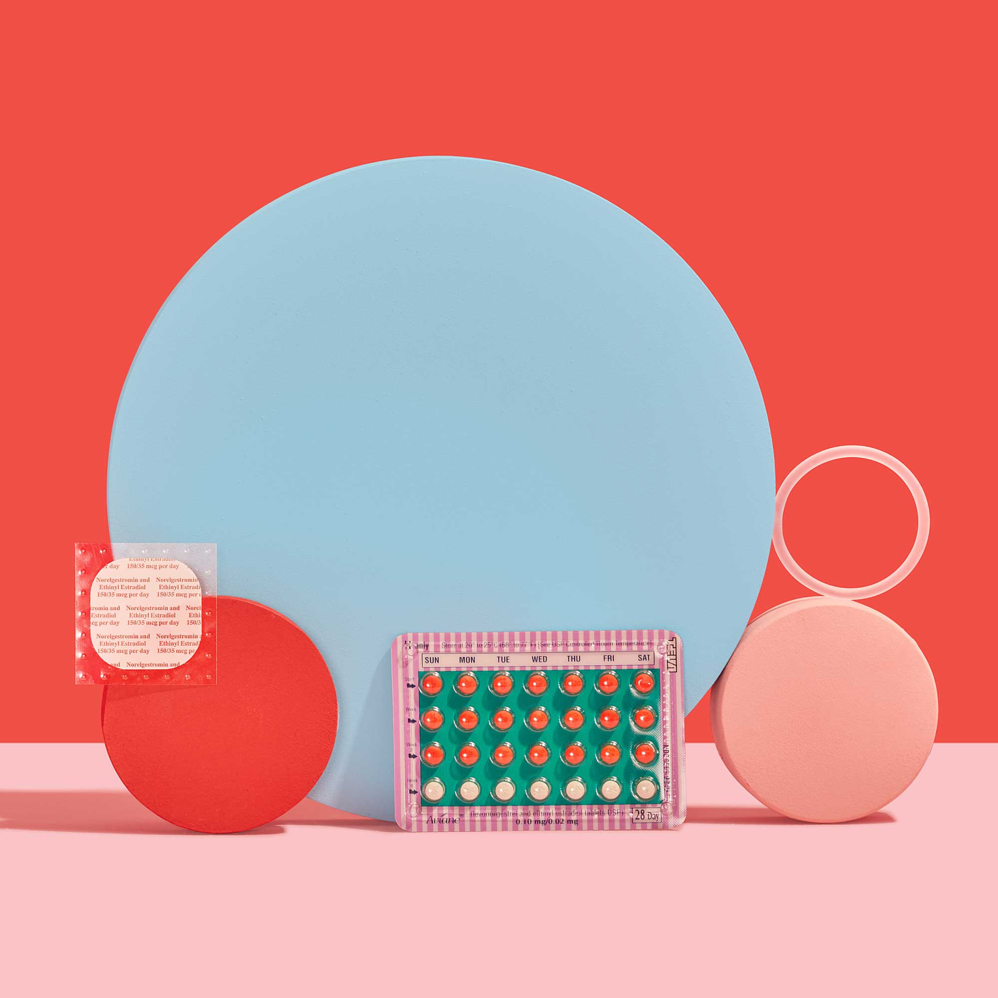 Birth Control pills, the birth control patch, and NuvaRing balanced on colorful abstract shapes on a pink surface with a red background