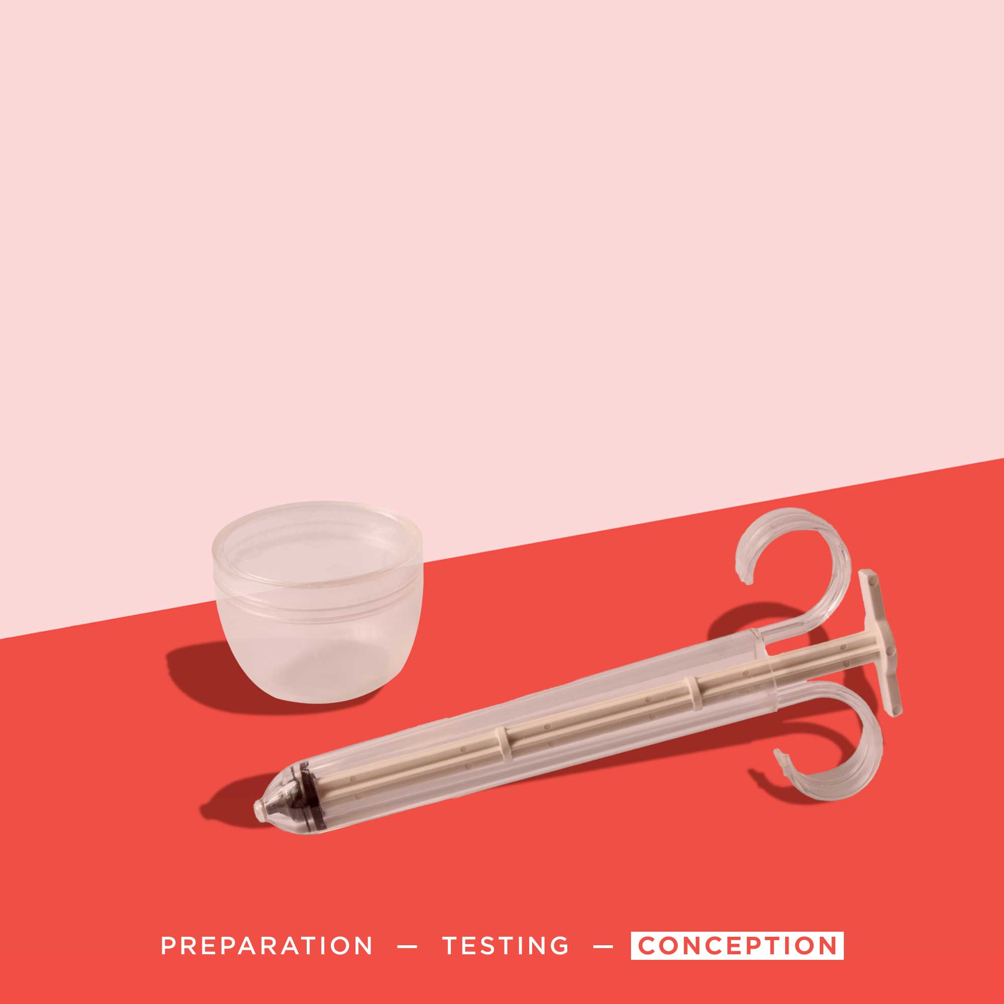 Pherdal collection cup and syringe on a red surface with a pink background