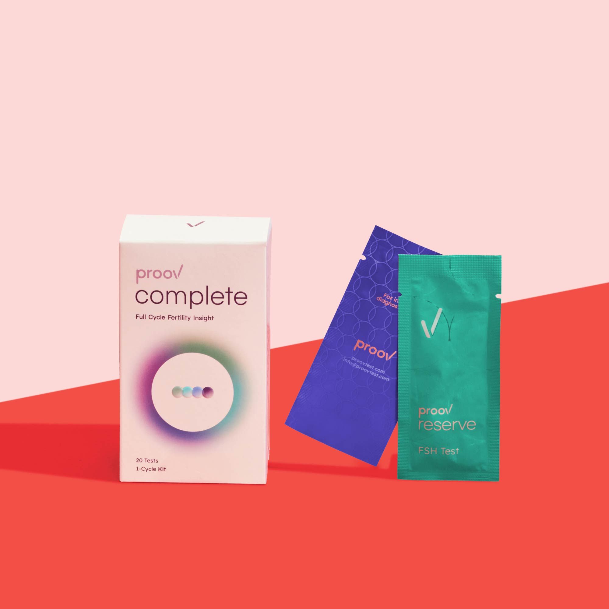 Proov Complete Testing Kit on a red surface with a pink background