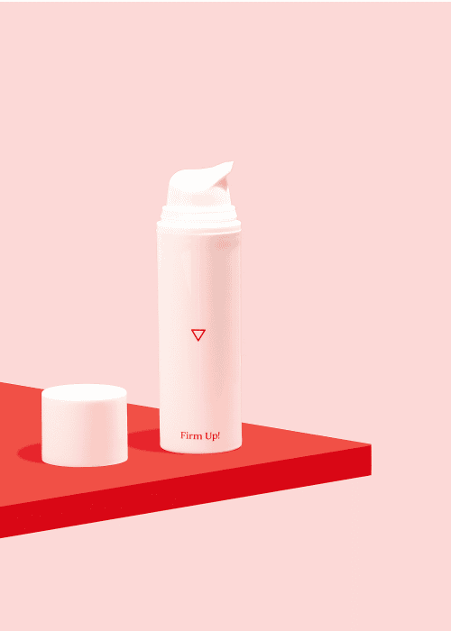 Bottle of Wisp Firm Up! Wrinkle Firming Cream sitting on a red surface on a pink background