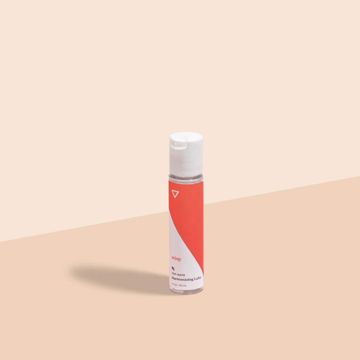 Wisp's Toy Safe Lube on a cream surface