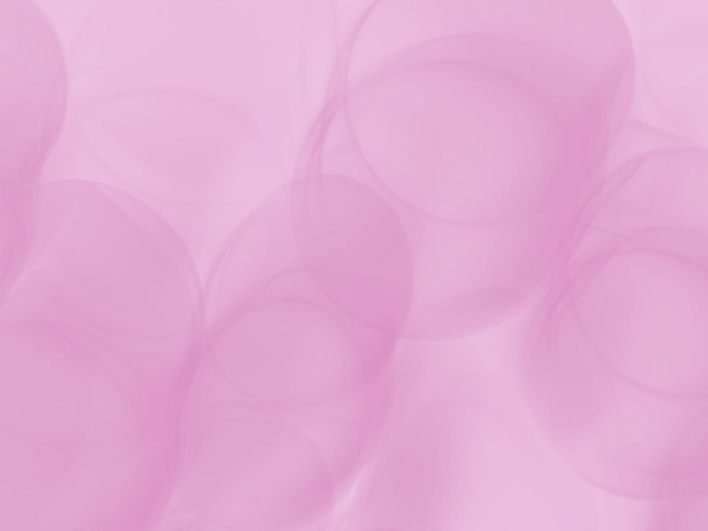 Soft abstract background with overlapping translucent pink and mauve shapes.