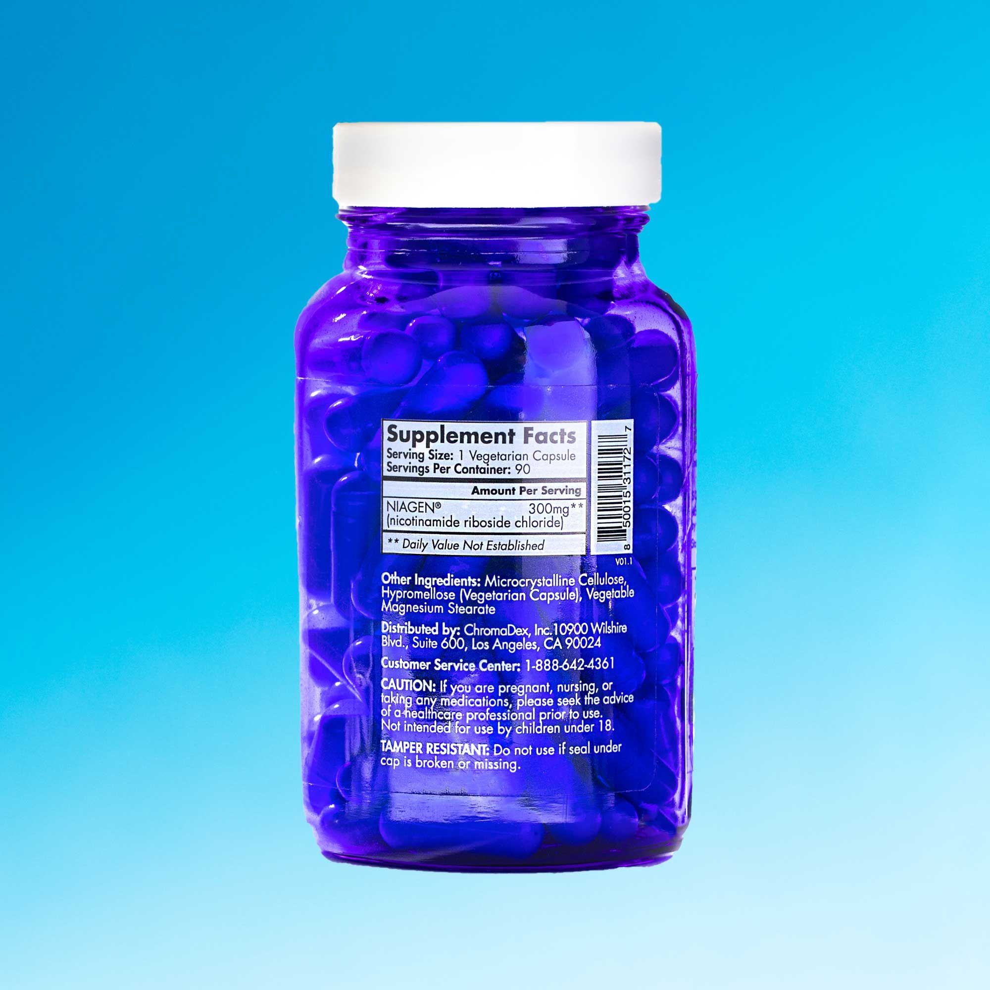 A blue Tru Niagen bottle with the Nutrition Facts showing in front of a light blue background