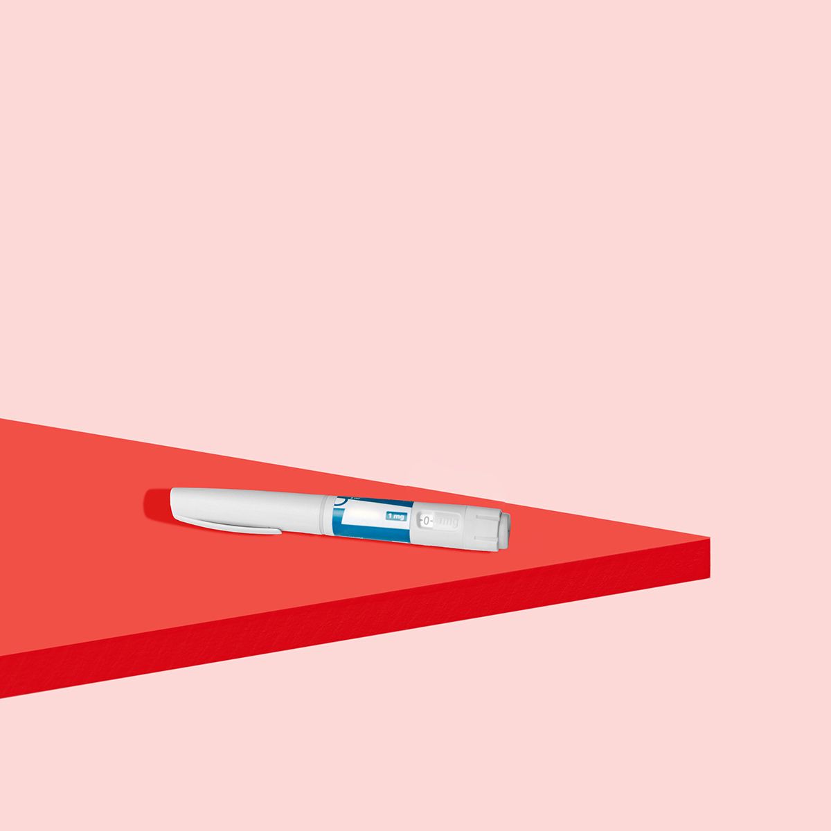 wegovy injectable on a red geometric background