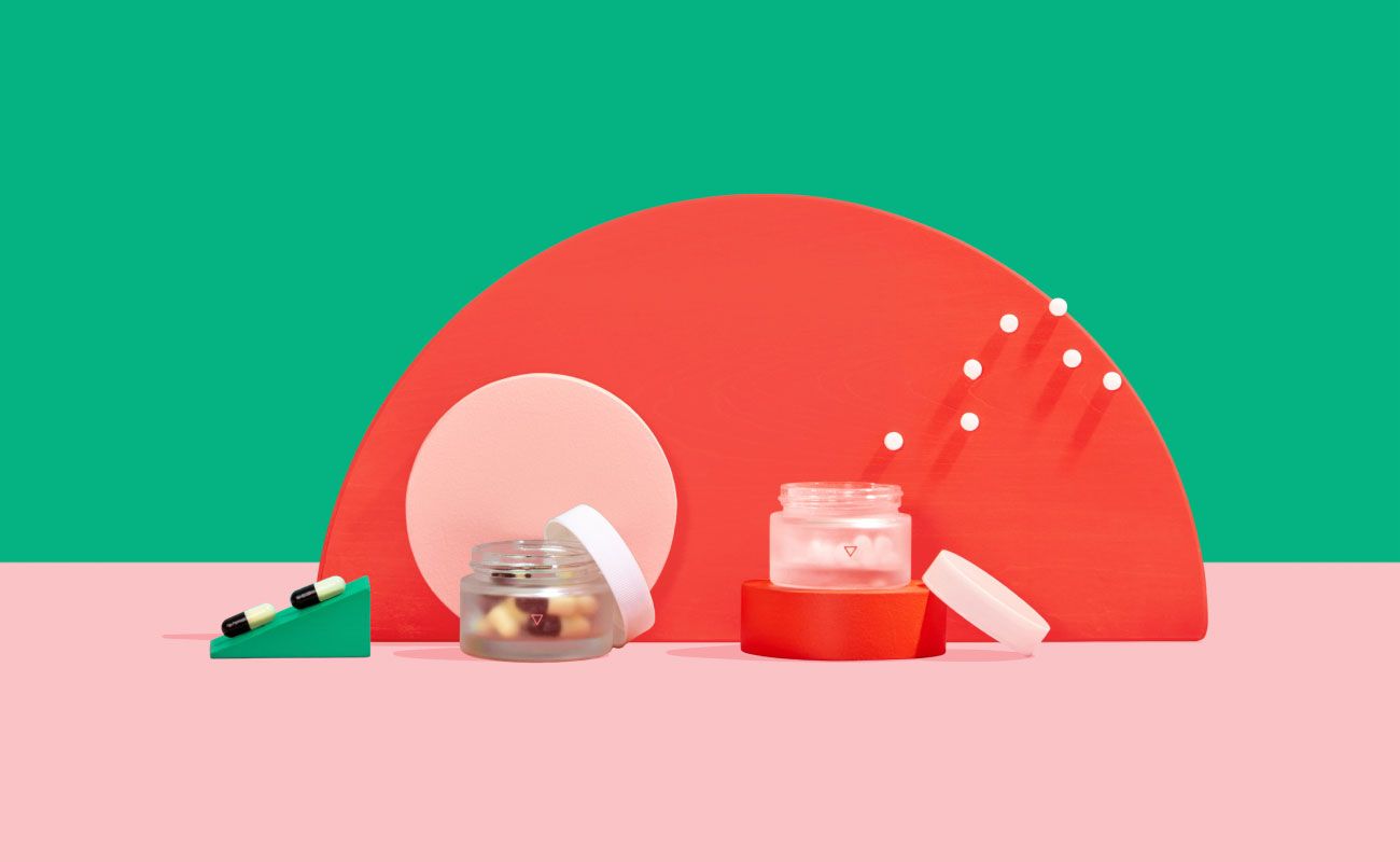 Antibiotics in Wisp jars on colorful geometric background