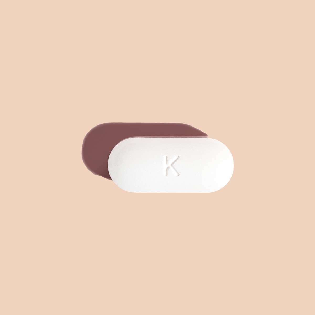 Single BV antibiotic tablet to treat bacterial vaginosis on a cream background