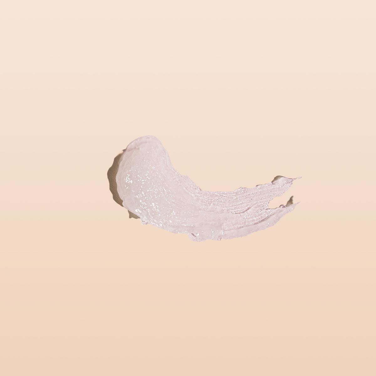 Smear of Acyclovir cream to treat oral and genital herpes on a cream background