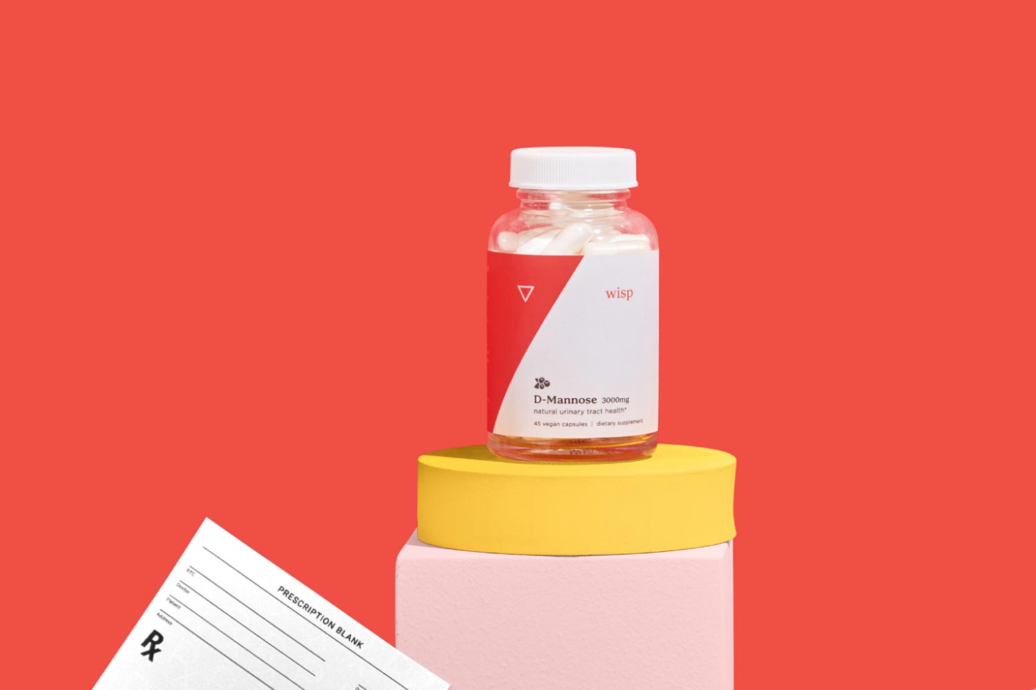 Wisp D-Mannose balanced on colorful abstract shapes and an RX script on a red background