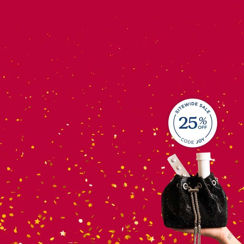 A woman's hand holding a black glittery bag with medications popping out of the top and a red and gold confetti background