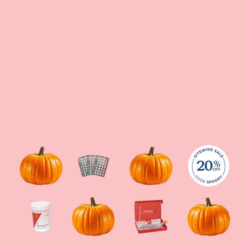 Pumpkins and various Wisp products with a pink background