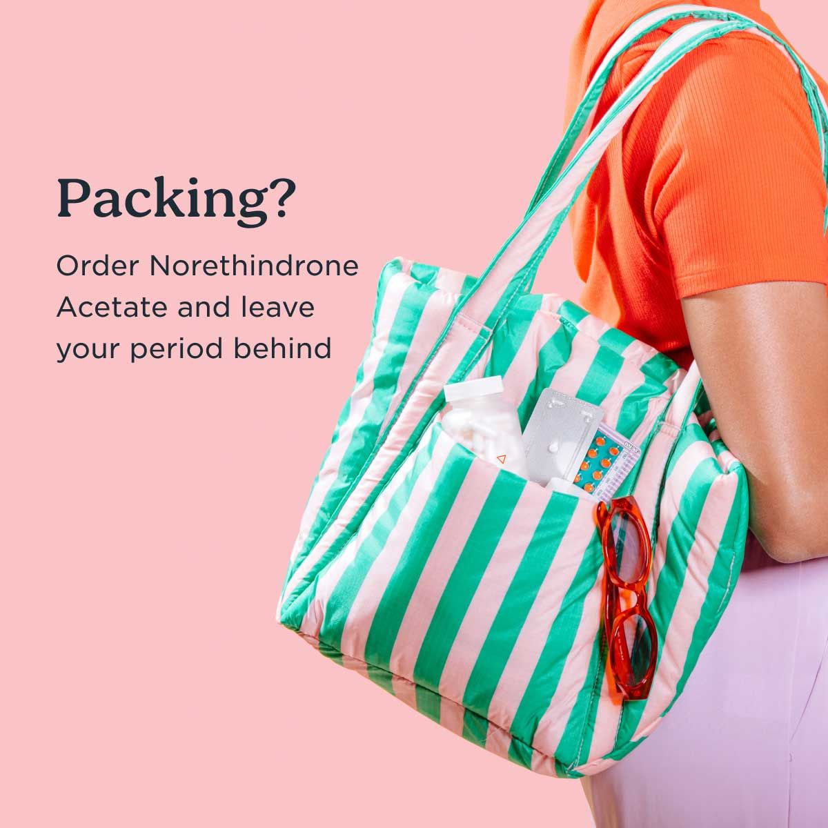 A woman carrying a pink and green striped bag with Wisp medications and sunglasses peeking out