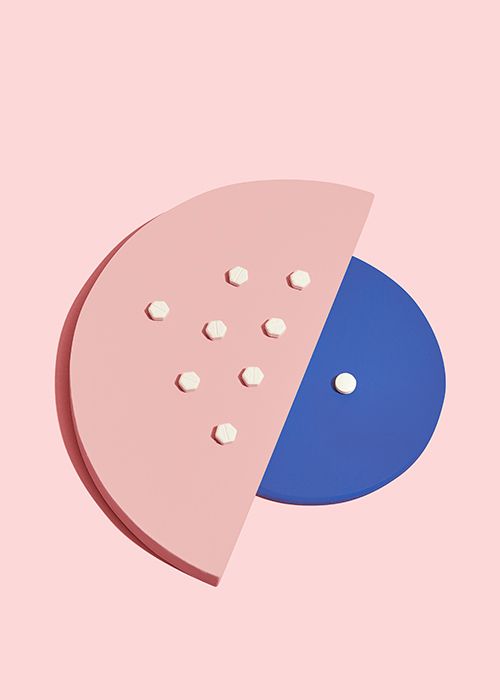 Mifepristone and Misoprostol pills for medication abortion on a pink and blue background
