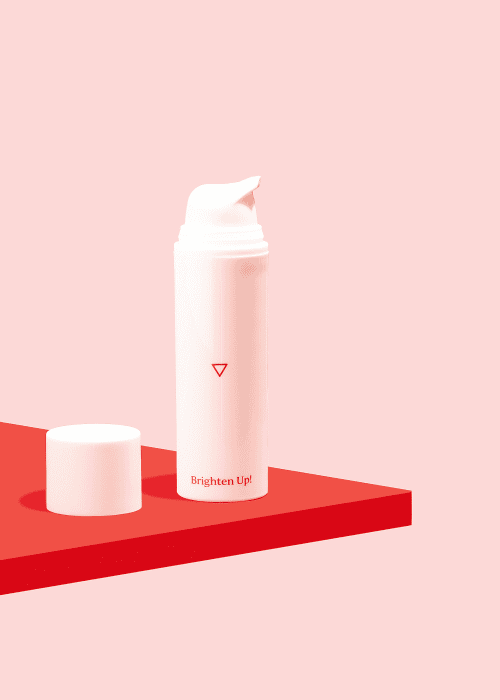 Bottle of Wisp Brighten Up! Hydroquinone Cream sitting on a red surface on a pink background