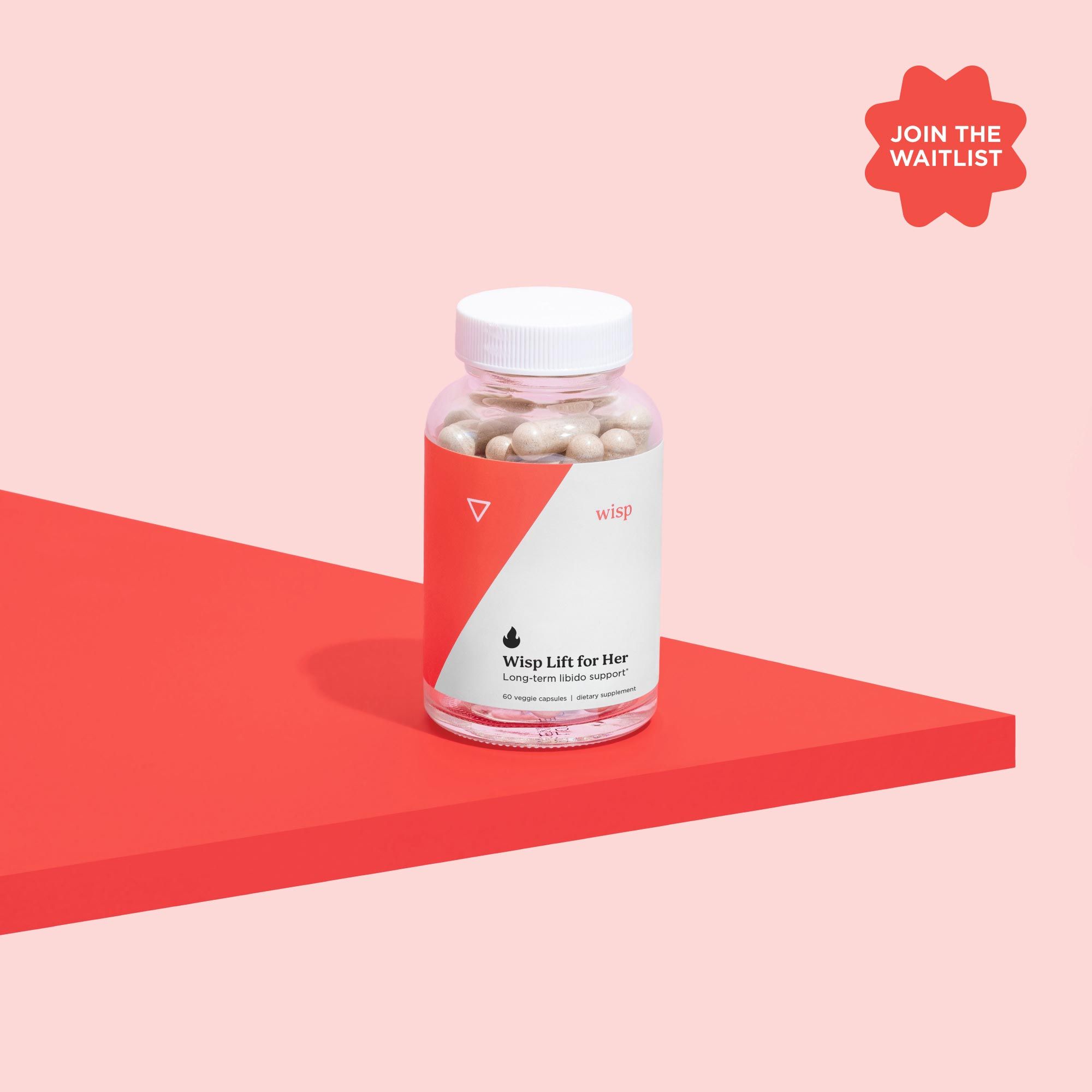 Wisp Lift Libido Supplements for Her on a red shelf with a pink background