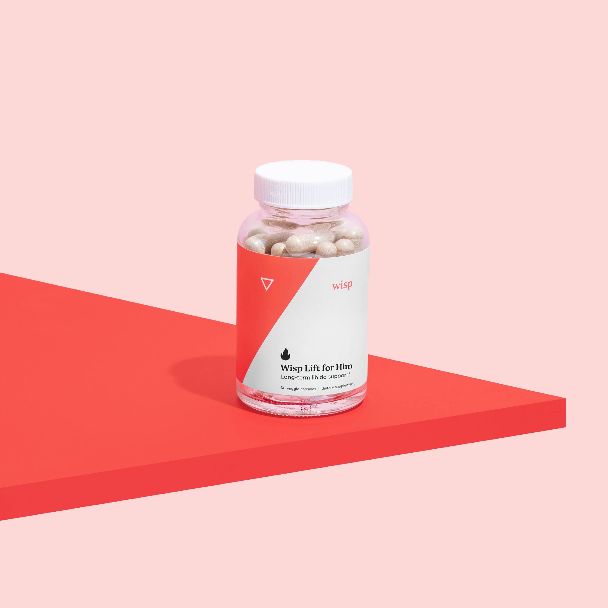 Wisp Lift Libido Supplements for Him on a red shelf with a pink background