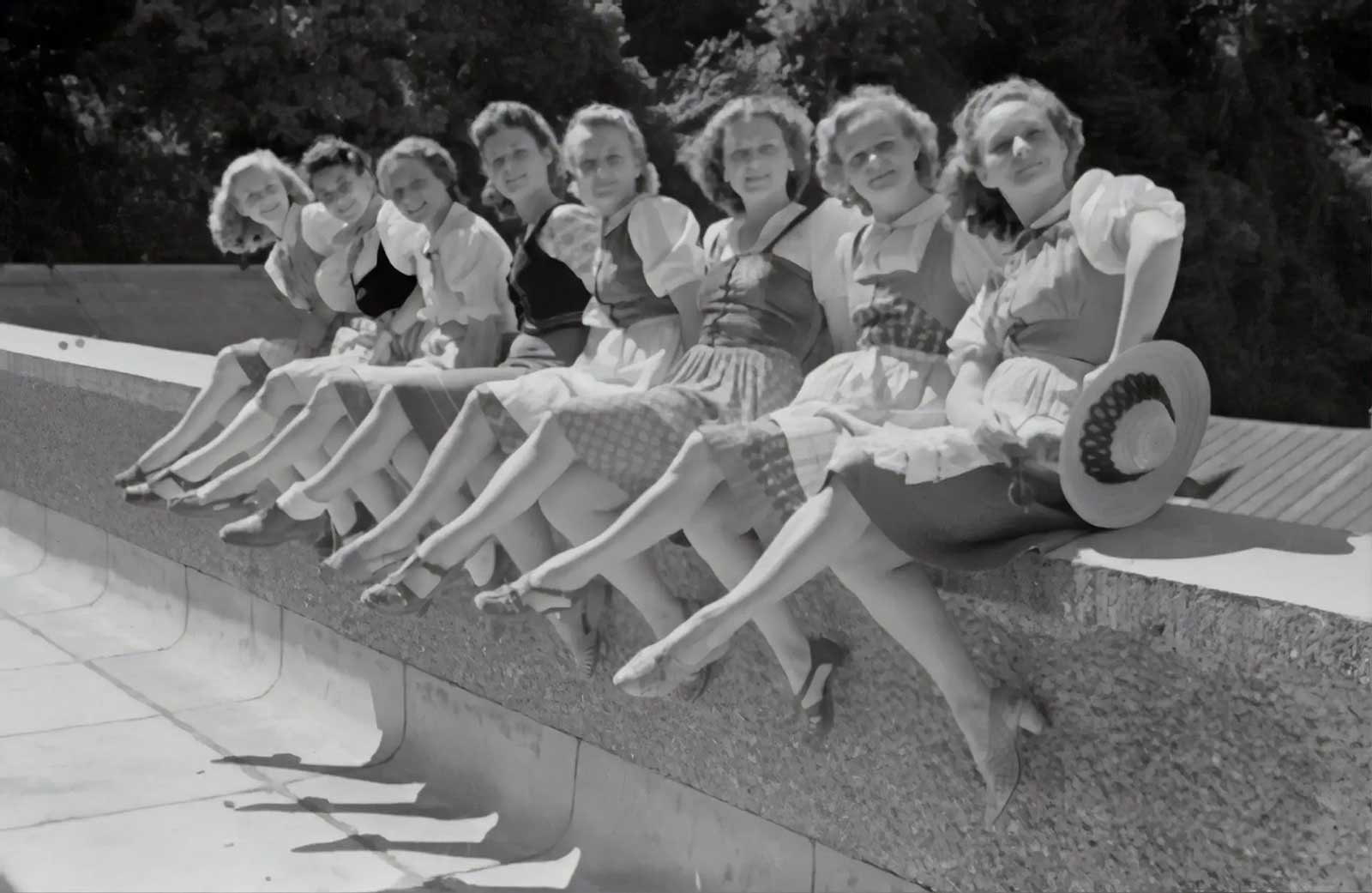retro women sitting in a line