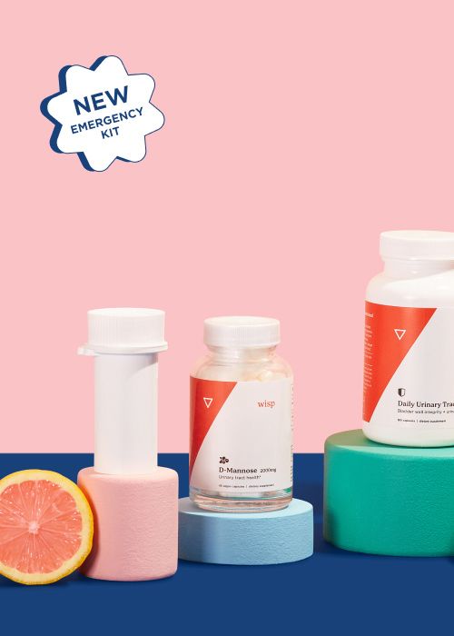 uti products on geometric shapes in front of a navy and pink background with a call-out for a new emergency kit