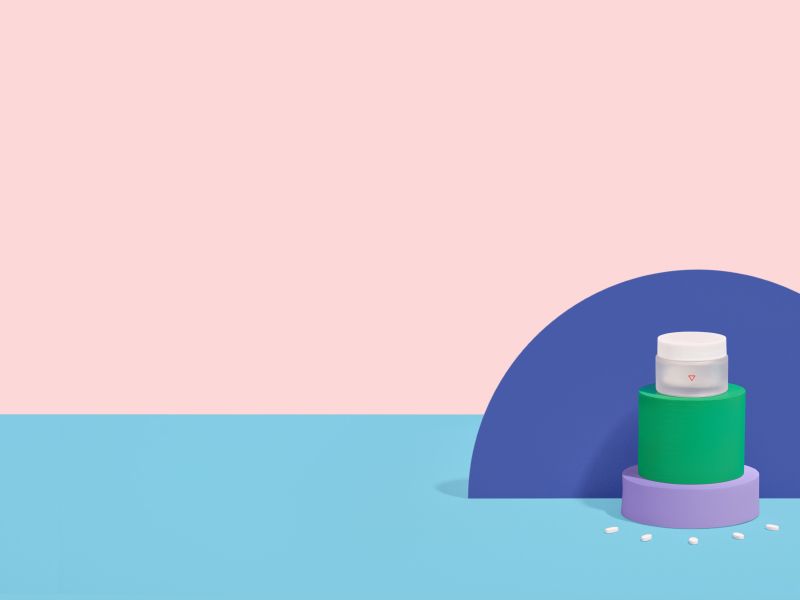 Wisp pill bottle with colorful organic shapes on a pink and blue background