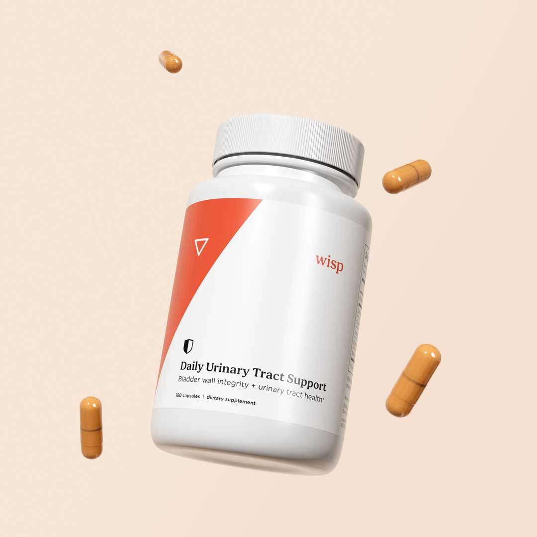 Wisp Daily Urinary Support Capsules on a cream surface