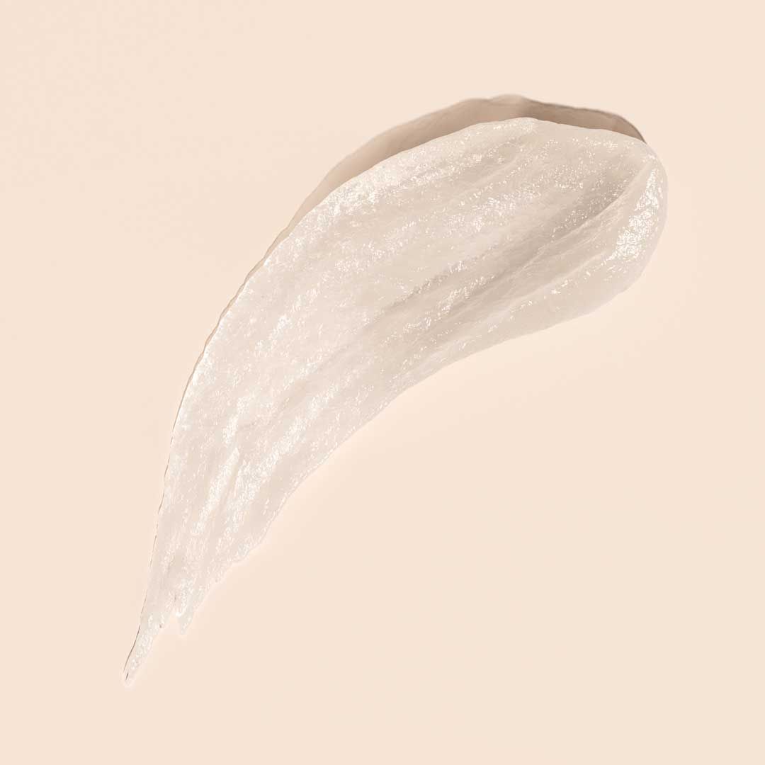 Smear of Acyclovir cream to treat oral and genital herpes on a cream background