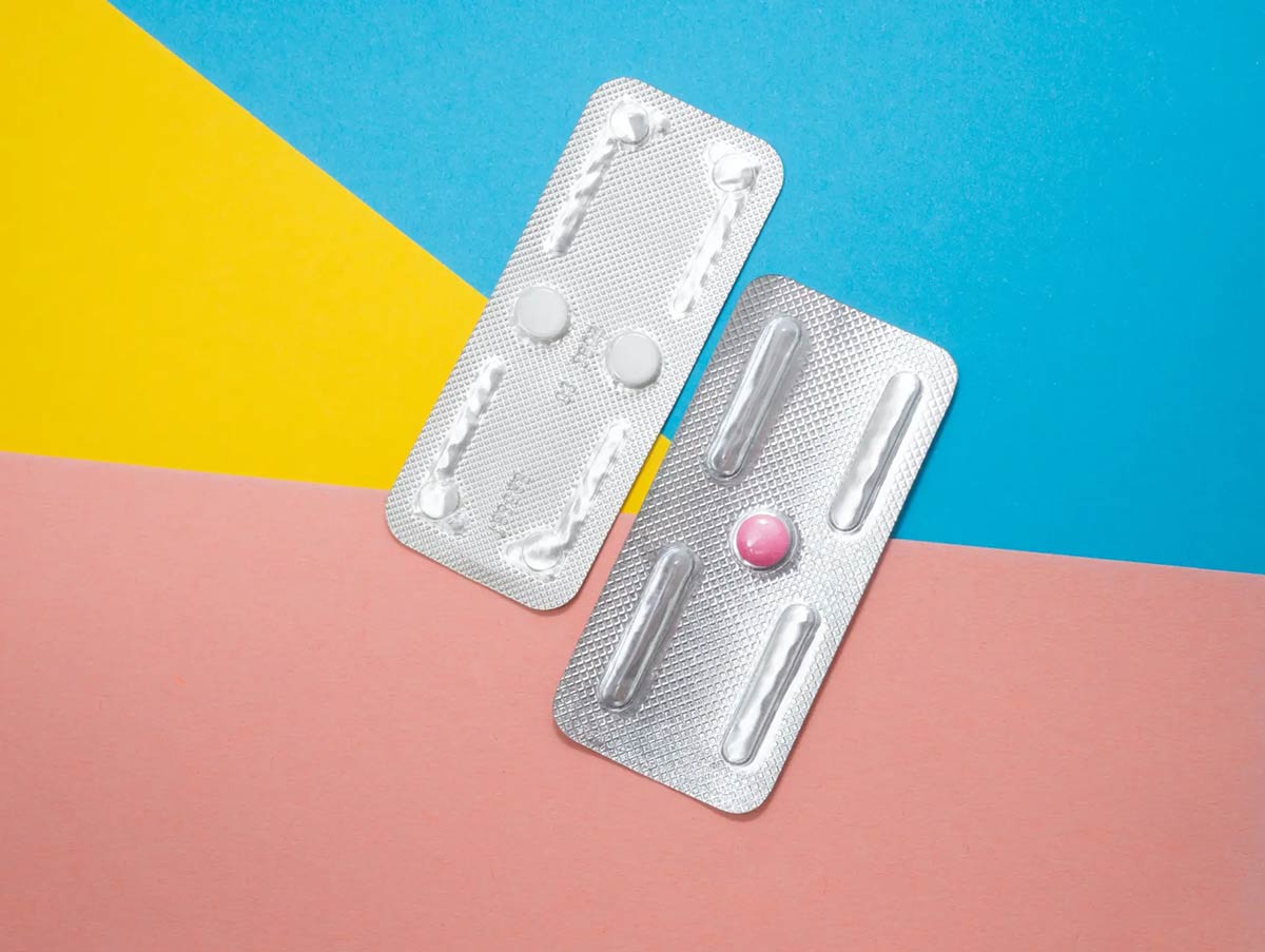 Two pill blister packs that illustrate the differences between Plan B and Ella